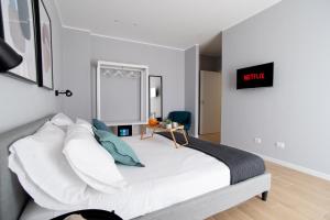 Postel nebo postele na pokoji v ubytování Il Pumo - Apulian Rooms Bari Piazza Moro