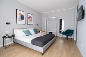 Postel nebo postele na pokoji v ubytování Il Pumo - Apulian Rooms Bari Piazza Moro