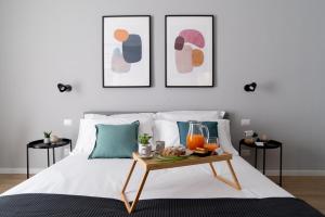 Postel nebo postele na pokoji v ubytování Il Pumo - Apulian Rooms Bari Piazza Moro