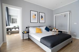 Postel nebo postele na pokoji v ubytování Il Pumo - Apulian Rooms Bari Piazza Moro