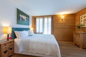 Postel nebo postele na pokoji v ubytování Chalet Balthazar