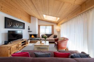 TV a/nebo společenská místnost v ubytování Chalet Balthazar