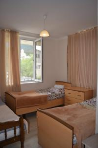 Postel nebo postele na pokoji v ubytování House in Mestia