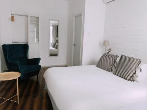 Postel nebo postele na pokoji v ubytování Boutike Guesthouse