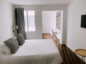 Postel nebo postele na pokoji v ubytování Boutike Guesthouse