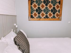 Postel nebo postele na pokoji v ubytování Boutike Guesthouse
