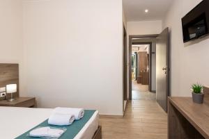 A bed or beds in a room at Sisi Breeze Hotel