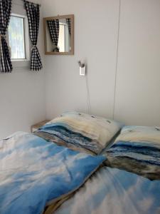 Postelja oz. postelje v sobi nastanitve Ostseeparadies Sierksdorf Panoramic