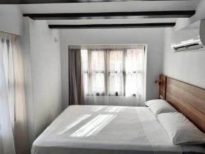 Postel nebo postele na pokoji v ubytování Hotel 19-30 Valencia