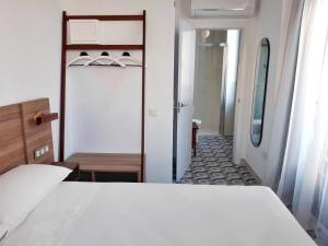 Postel nebo postele na pokoji v ubytování Hotel 19-30 Valencia