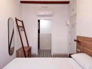 Postel nebo postele na pokoji v ubytování Hotel 19-30 Valencia