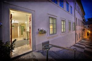 a facade of a building with a glass door at Nobles Apartments in Prague +121 photos