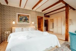 Ένα ή περισσότερα κρεβάτια σε δωμάτιο στο Hotel Barcadam