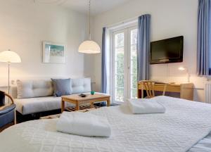 Tempat tidur dalam kamar di Hotel Siemsens Gaard