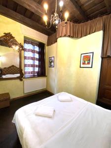 Кровать или кровати в номере Квартира подобово на Площі Ринок 39а