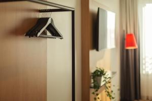 TV/Unterhaltungsangebot in der Unterkunft Holiday Inn - the niu, Sparrow Regensburg by IHG