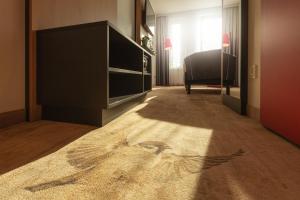 Ein Bett oder Betten in einem Zimmer der Unterkunft Holiday Inn - the niu, Sparrow Regensburg by IHG