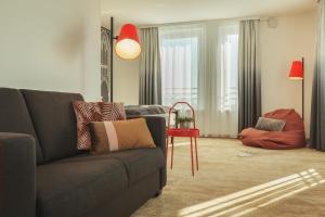 Ein Sitzbereich in der Unterkunft Holiday Inn - the niu, Sparrow Regensburg by IHG