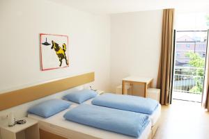 Postel nebo postele na pokoji v ubytování Manzoni Rooms
