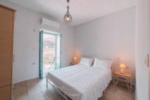 Postelja oz. postelje v sobi nastanitve George SeaFront Suites