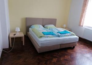 Ένα ή περισσότερα κρεβάτια σε δωμάτιο στο Willa Mare Nostrum Gdynia - pokoje gościnne