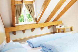 Postel nebo postele na pokoji v ubytování Manzoni Rooms