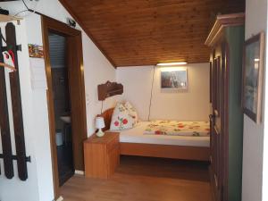 Postel nebo postele na pokoji v ubytování Hiasl Stubn