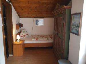 Postel nebo postele na pokoji v ubytování Hiasl Stubn