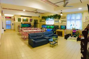 TV a/nebo společenská místnost v ubytování Coastal Park Hotel