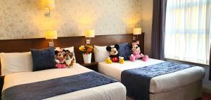 Letto o letti in una camera di The Gate Hotel