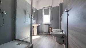 Un baño de Bergamo GuestHouse - Self Check-in