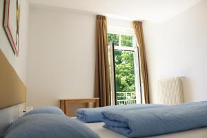 Postel nebo postele na pokoji v ubytování Manzoni Rooms