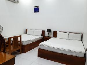 Postel nebo postele na pokoji v ubytování hotel đăng khôi 2