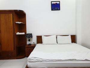 Postel nebo postele na pokoji v ubytování hotel đăng khôi 2