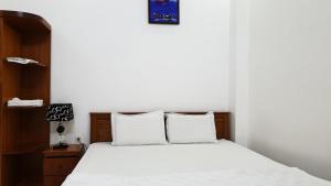 Postel nebo postele na pokoji v ubytování hotel đăng khôi 2