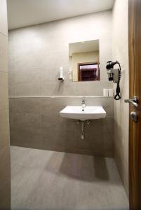Łazienka w obiekcie Hotel Roudna