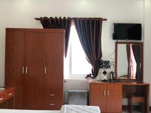 TV a/nebo společenská místnost v ubytování hotel đăng khôi 2
