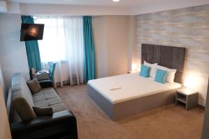 Postel nebo postele na pokoji v ubytování Hotel Bordeaux