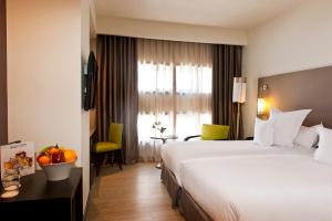 Postel nebo postele na pokoji v ubytování Barceló Casablanca