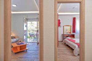 Postel nebo postele na pokoji v ubytování Apartmani Putnik