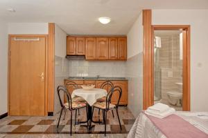 Postel nebo postele na pokoji v ubytování Apartmani Putnik
