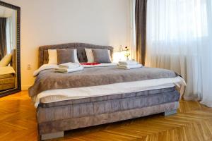 Krevet ili kreveti u jedinici u objektu Apartment De Luna Belgrade