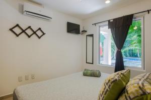 Cama o camas de una habitación en Villas Picalu Lodge