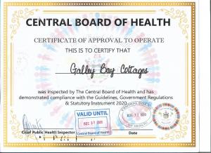 un certificato di approvazione di un'organo odontoiatrico di sanità di Spice Cottage a Five Islands Village