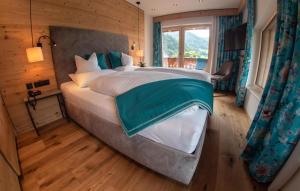 Voodi või voodid majutusasutuse Hotel Tipotsch toas