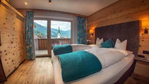 Voodi või voodid majutusasutuse Hotel Tipotsch toas