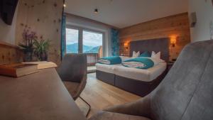 Voodi või voodid majutusasutuse Hotel Tipotsch toas