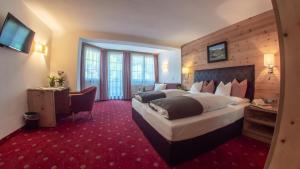 Voodi või voodid majutusasutuse Hotel Tipotsch toas