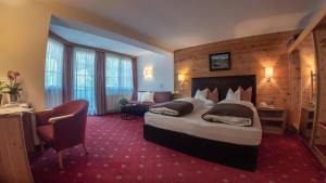Voodi või voodid majutusasutuse Hotel Tipotsch toas