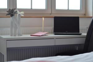 TV a/nebo společenská místnost v ubytování Landhotel Zerlaut